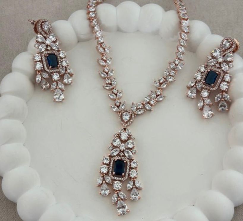 Rosegold Diamond necklace set with blue stone
