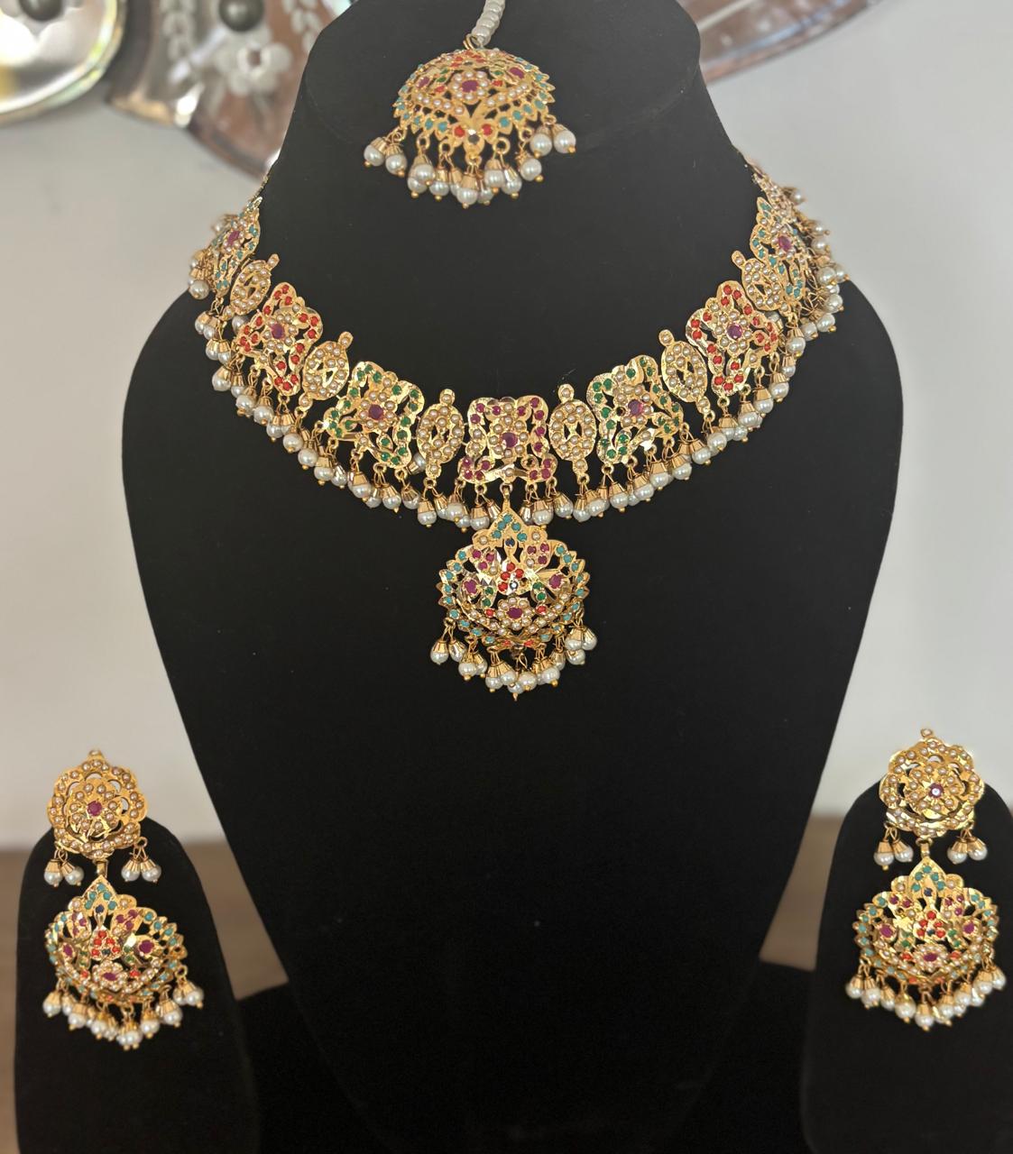 Bride wearing jadau multistone pearls royal Bridal necklace  set