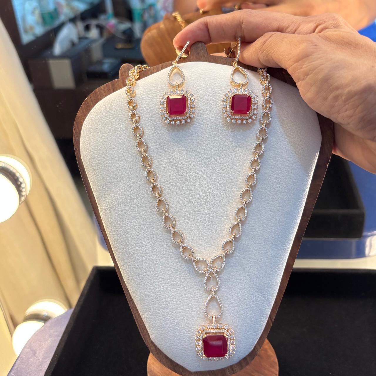 replica of fine jewellery luxurious ruby and american  diamond necklace set