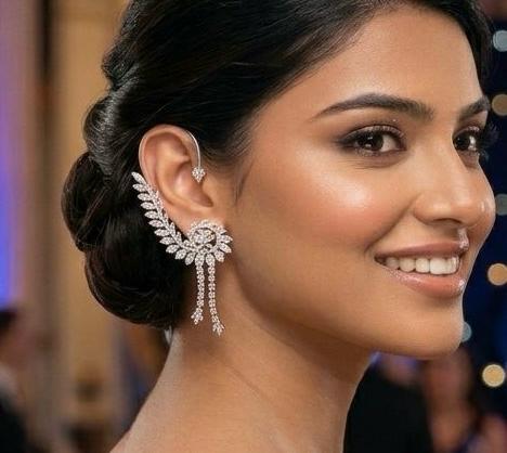 Silver  plated ear cuff earrings with americn diamonds.